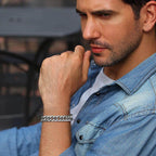 Stylish Cuban link bracelets for men worn by a model in casual attire