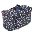 Bolsa de viaje floral colorida para artículos esenciales de viaje