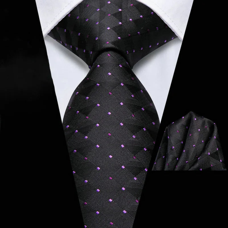 Black silk tie with purple pattern, perfect for learning how to tie men's tie