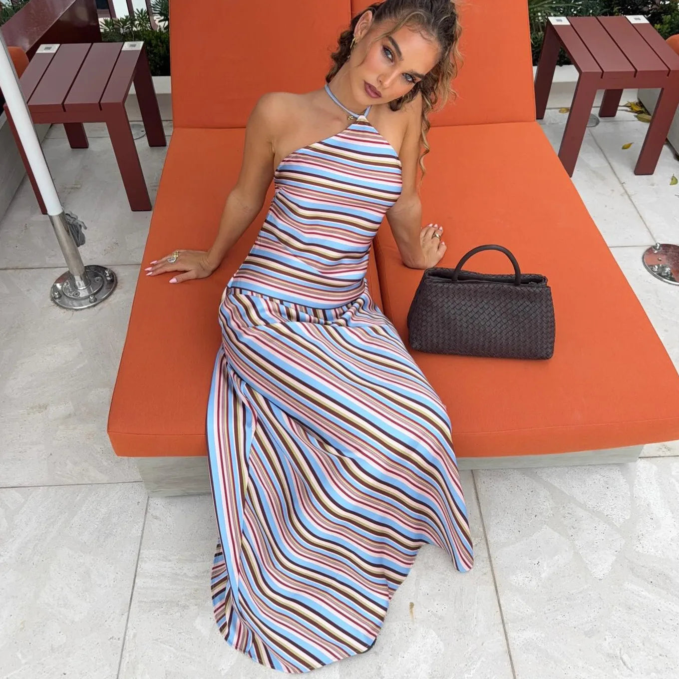 Women's colorful striped halter maxi dress, perfect for summer outings