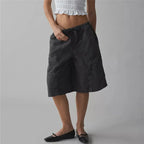Women's black cargo shorts in y2k fashion, perfect for casual outings