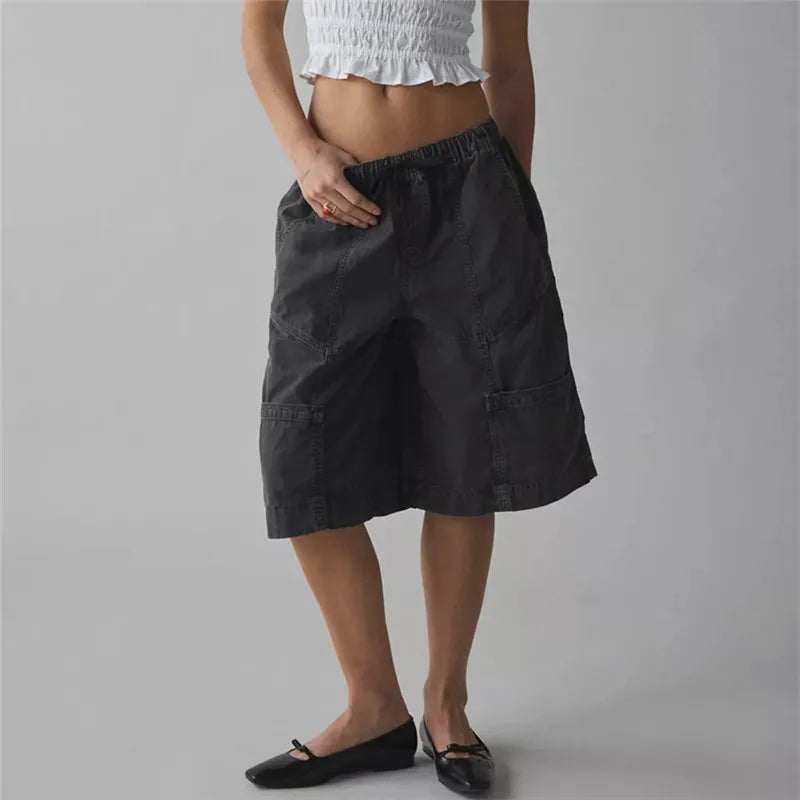 Women's black cargo shorts in y2k fashion, perfect for casual outings