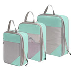 Set of mint green compression packing cubes for travel, lightweight and durable