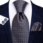 Elegant black and pink patterned men's tie, perfect for formal occasions