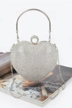 Rhinestone heart shape clutch with a silver chain strap for elegant outings and special occasions