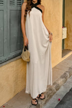 Stylish summer off shoulder maxi dress in light beige, perfect for a casual day out
