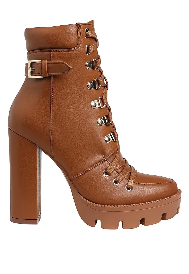 Brown platform boot with block heel on a white background