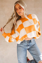 Women's SweatersOrange Checkered Bishop Sleeve Sweater - VacationGrabs