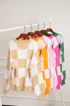 Women's SweatersOrange Checkered Bishop Sleeve Sweater - VacationGrabs