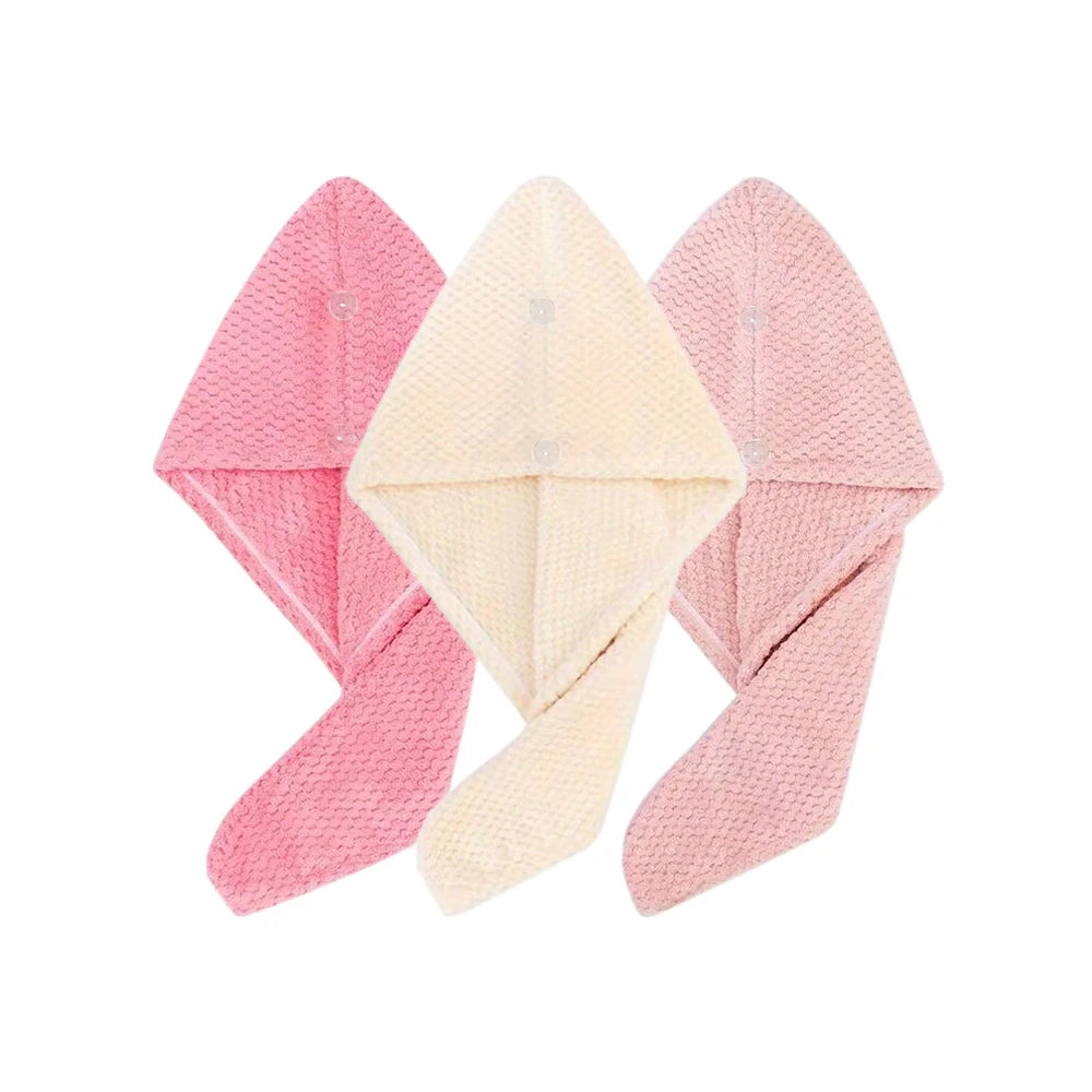Absorbent hair towel wrap for women in pink and cream.