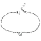 Adjustable rhodium plated bracelet featuring a sparkling charm for women