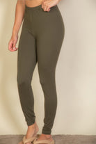 Olive green affordable leggings for vacation with a comfortable elastic waistband for easy movement