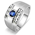 Stylish affordable stainless steel rings featuring a blue stone and crystal accents for men's jewelry