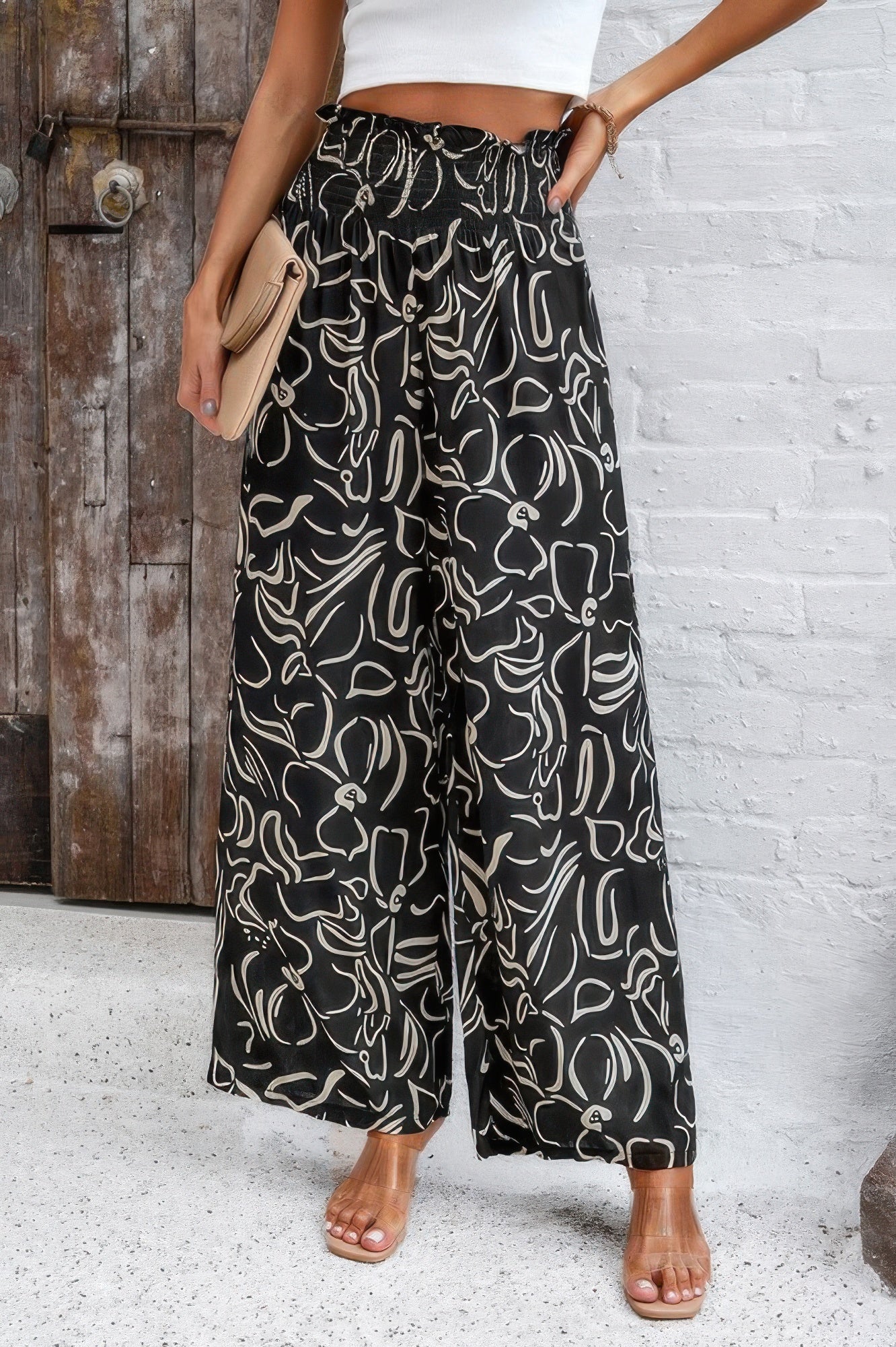 VacationGrabs women's allover print vacation pants in black and white with wide leg and elastic waistband