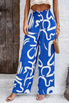 VacationGrabs women's blue allover print vacation pants with white abstract design and wide leg fit