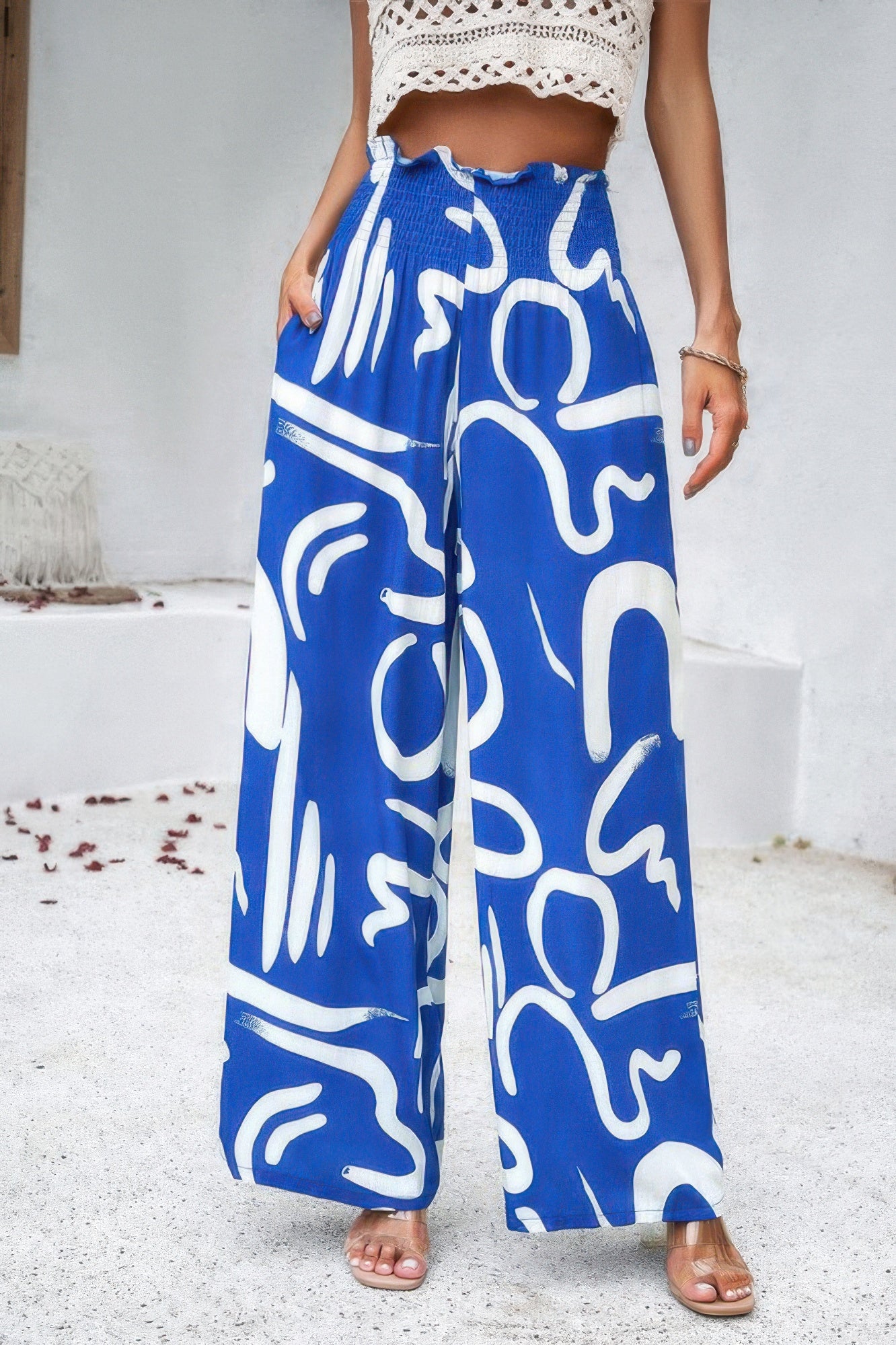VacationGrabs women's allover print vacation pants in blue with white abstract design and wide leg style