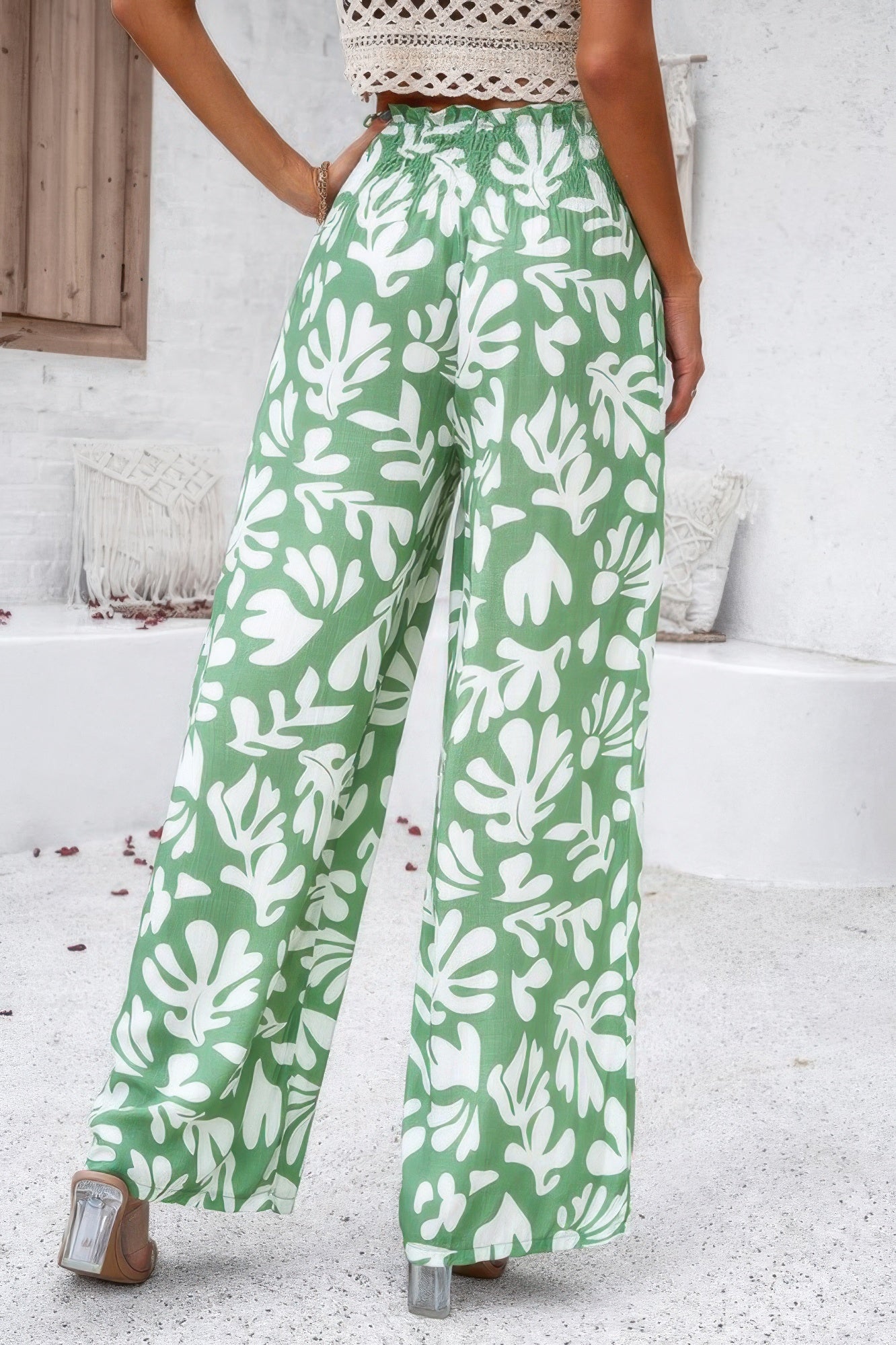 VacationGrabs allover print vacation pants in green with white leaf patterns, wide leg style for women