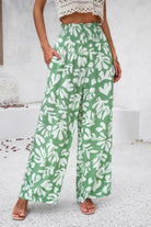 VacationGrabs women's green allover print vacation pants with white leaf pattern and elastic waistband