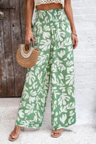 VacationGrabs women's allover print vacation pants in green with white leaf pattern and wide leg design
