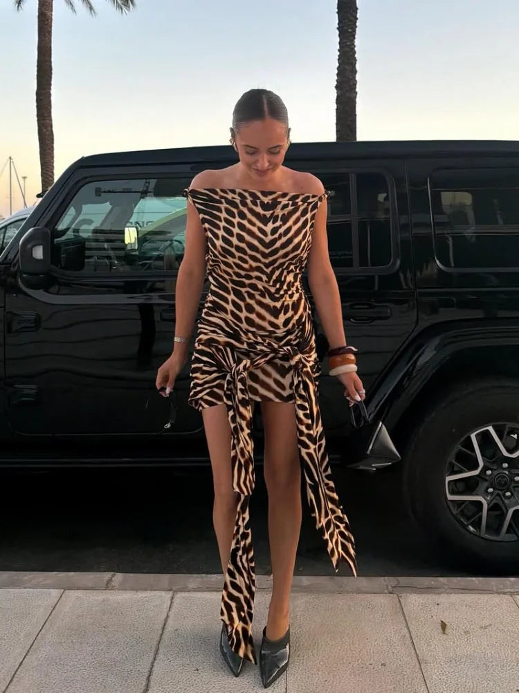 VacationGrabs off-shoulder animal print and bodycon dress, perfect for summer outings.