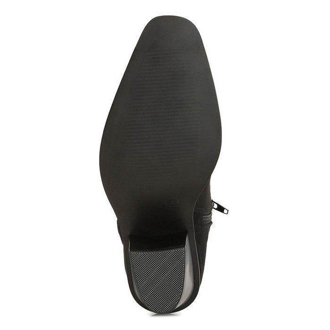 Sleek bottom view of Rag Company ankle length western boots with durable tread for stability and style