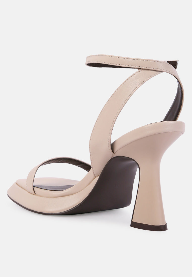 Stylish ankle strap kitten heel sandals in beige with a modern design for elegant looks