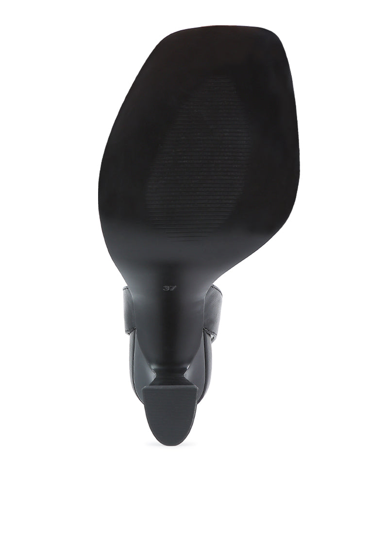 Sleek black ankle strap kitten heel sandals with a stylish design and comfortable sole