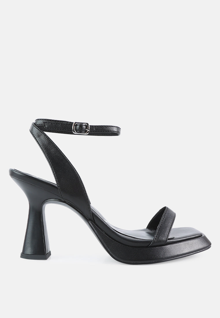 Stylish black ankle strap kitten heel sandals with a modern design and comfortable fit
