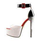 VacationGrabs ankle strap stilettos with a black and white striped heel and a bold platform design