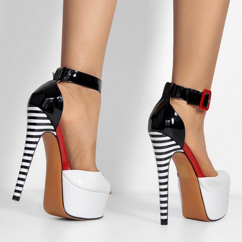 Stylish VacationGrabs ankle strap stilettos with a black and white striped heel design