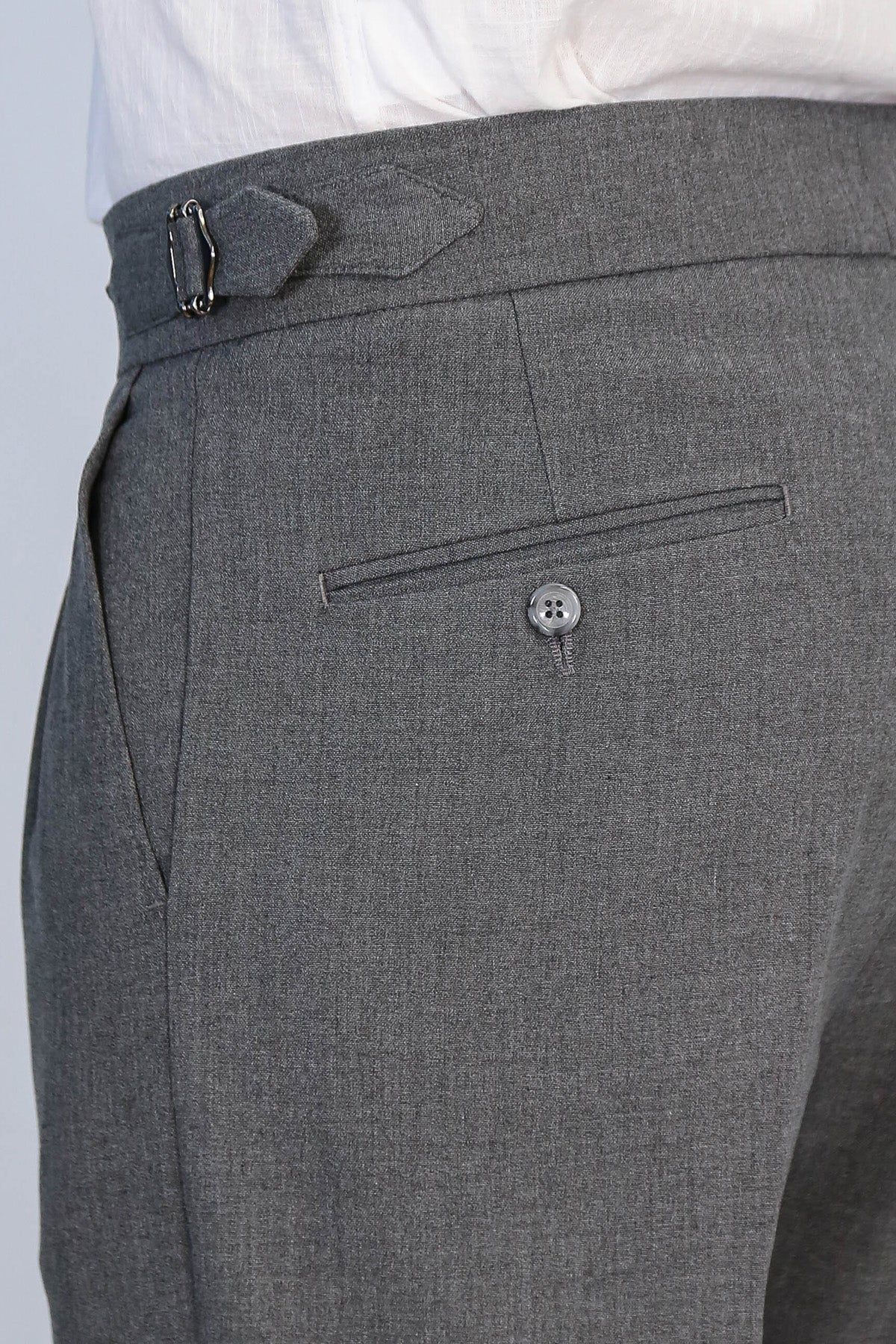 Anthracite Double-Pleated High-Waisted Slim Fit Trousers with Side Buckles – fabric detail view