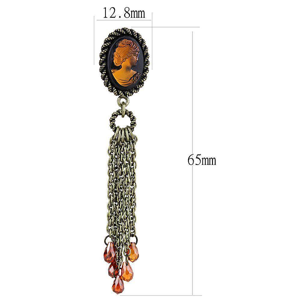 Antique copper brass earrings with a cameo design and dangling chain accents