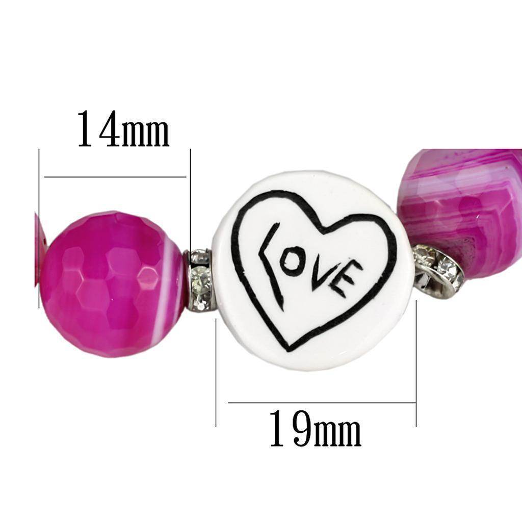 Antique silver brass bracelet with onyx featuring colorful beads and a love charm