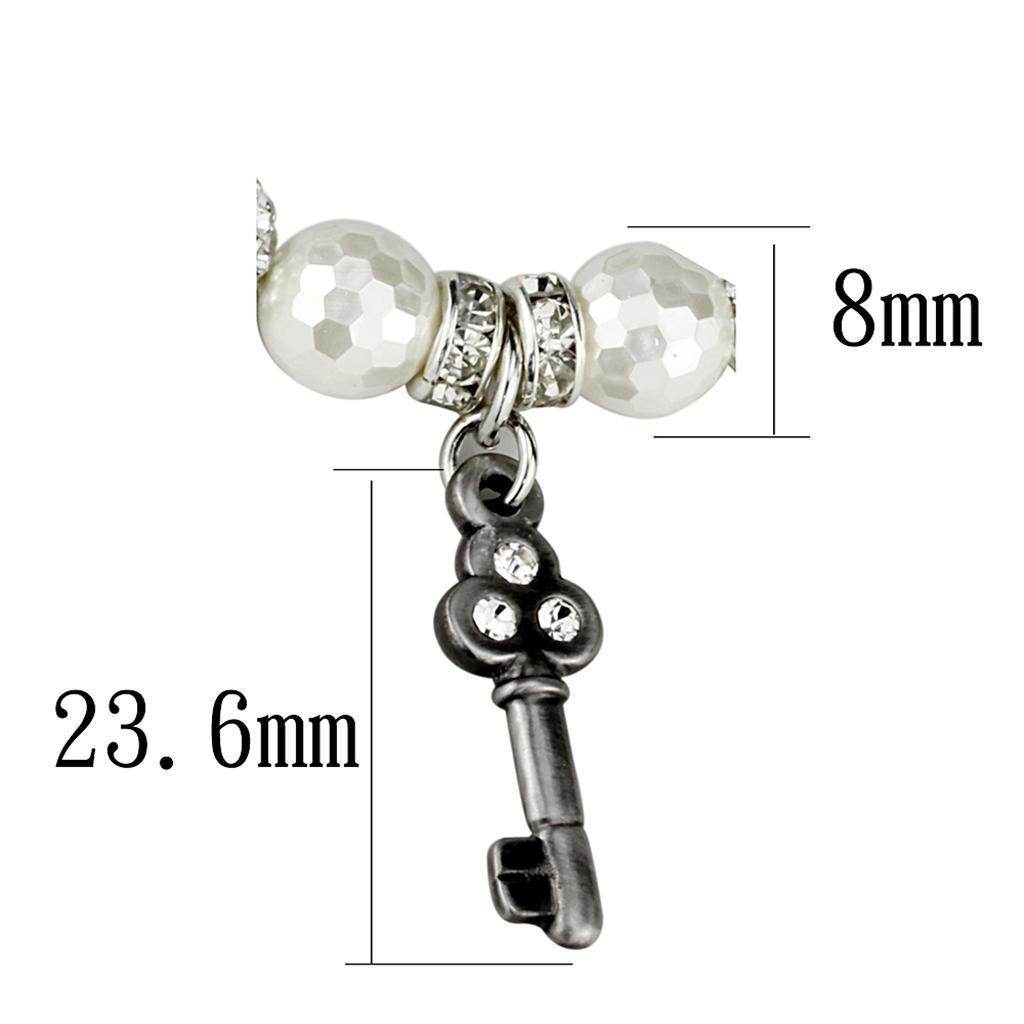 Antique silver brass women's bracelet featuring key charm and decorative beads with measurement details