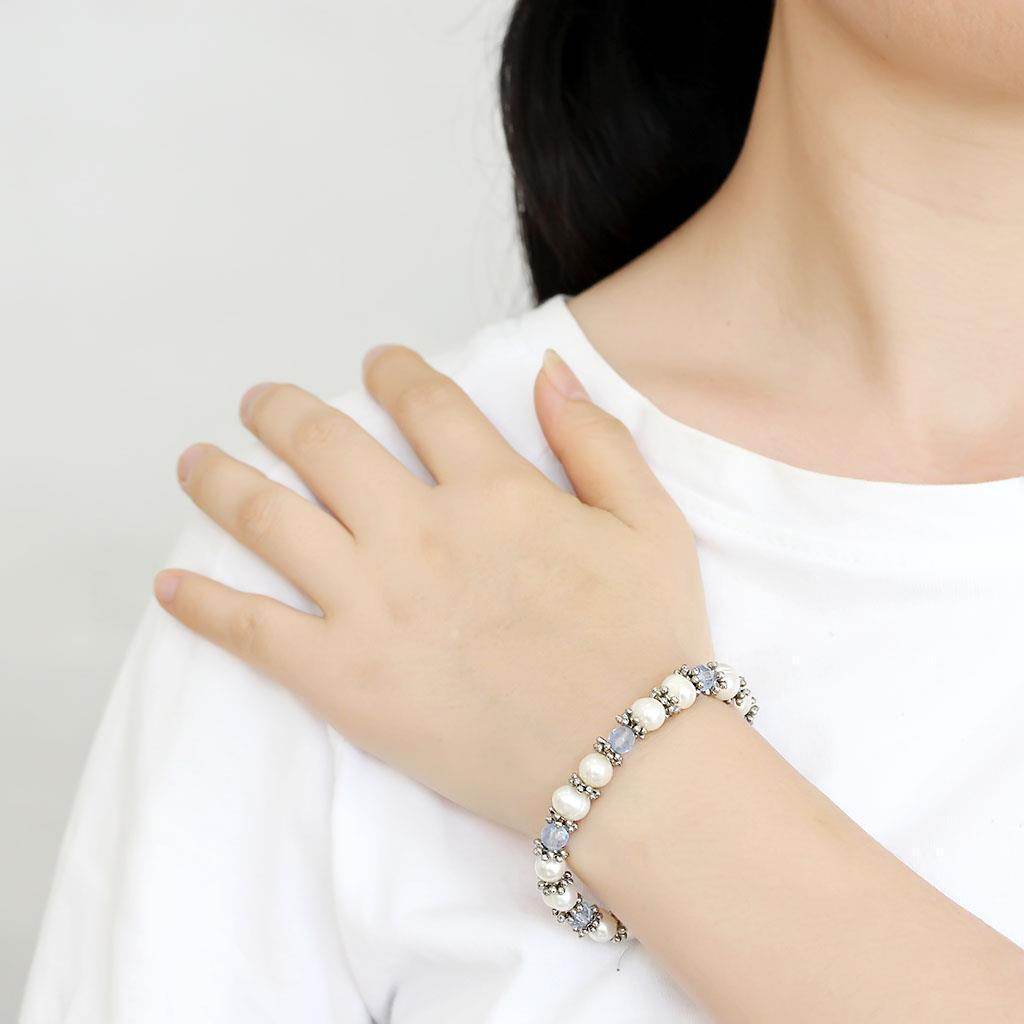 Antique silver women's bracelet featuring decorative beads for stylish accessorizing