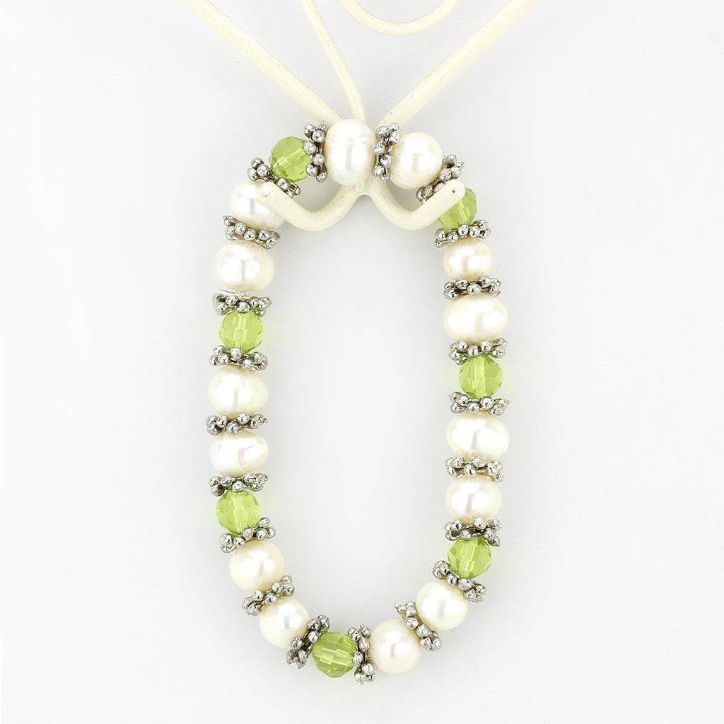 Antique silver women's bracelet featuring green and white pearls with decorative beads