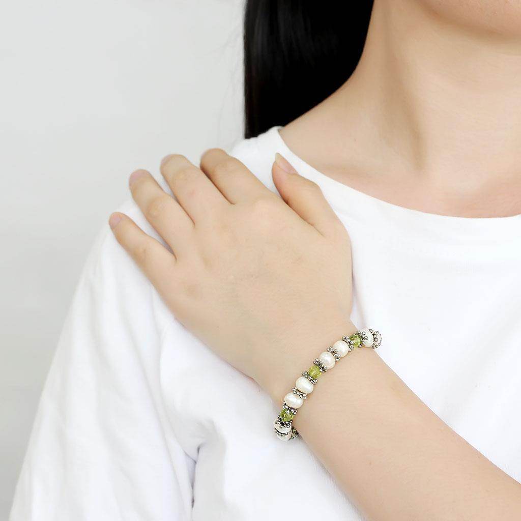 Antique silver women's bracelet with colorful beads, perfect for casual or elegant outfits