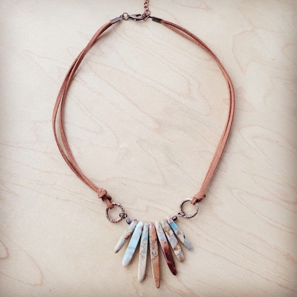 Aqua Terra leather necklace featuring elongated stones on a soft leather cord for a stylish look