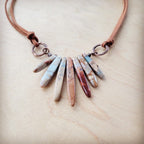 Aqua Terra leather necklace featuring natural stone pendant in earthy tones on a leather cord