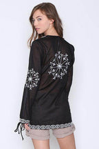 Qwasabee Aztec long sleeve top in black with intricate embroidered designs on the back