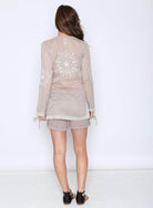 Qwasabee Aztec long sleeve top in beige with intricate embroidery on the back for a stylish look