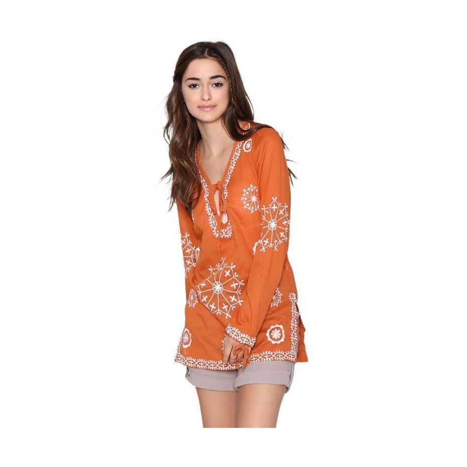 Qwasabee Aztec long sleeve top in orange with intricate white embroidery for a stylish look