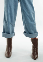 Rag Company metallic accent ankle boots stylishly paired with rolled denim jeans