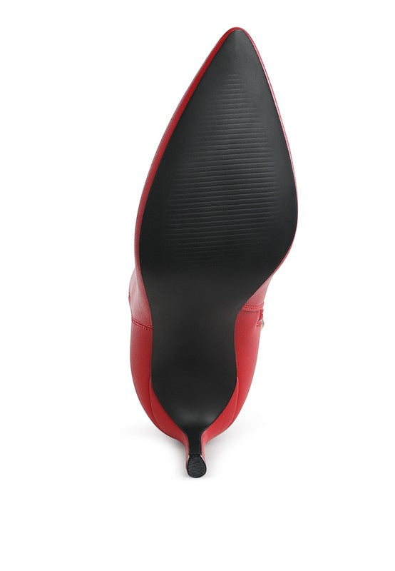Red textured stiletto heel ankle boots with a sleek pointed toe design
