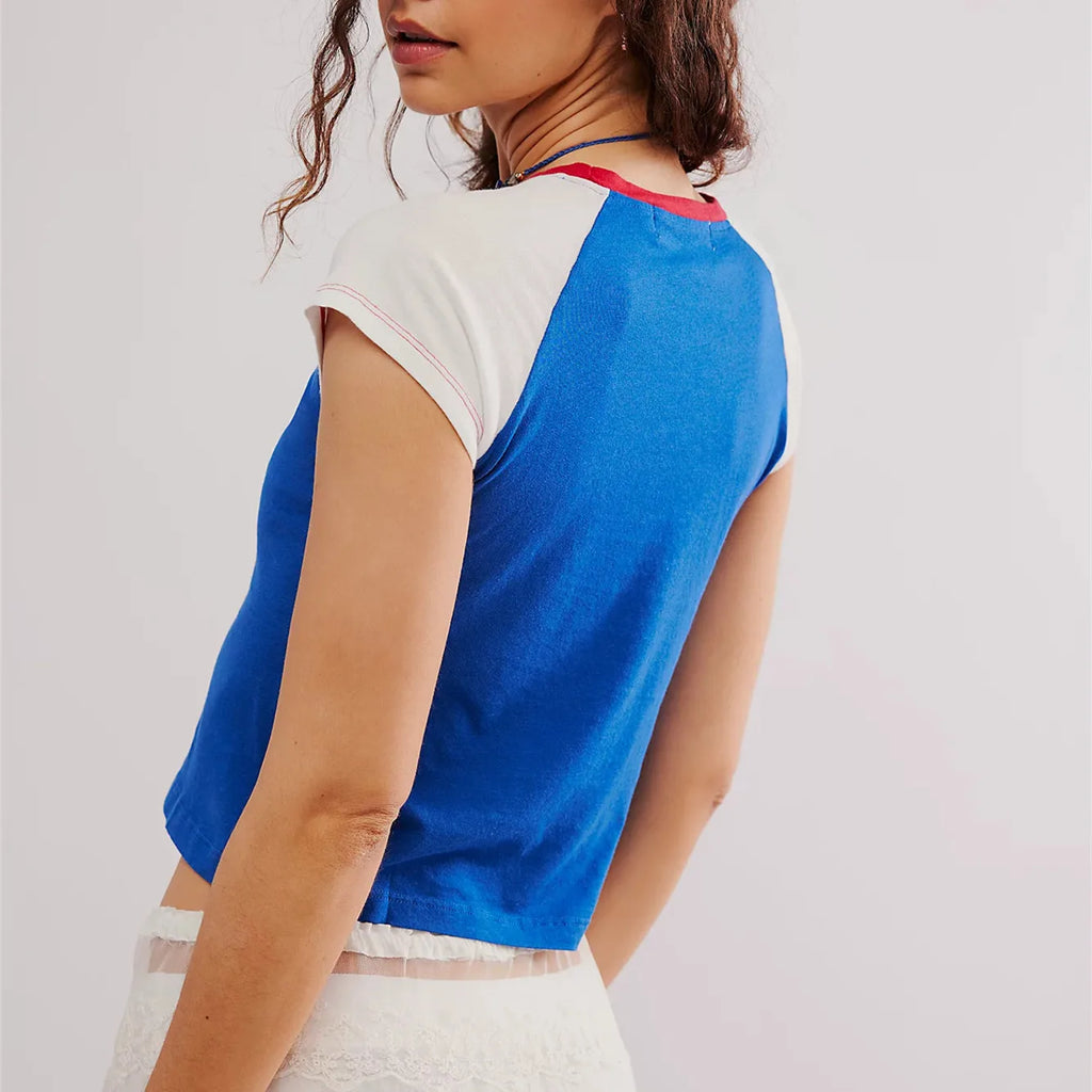 Women's blue baby tees with contrasting white sleeves, casual wear