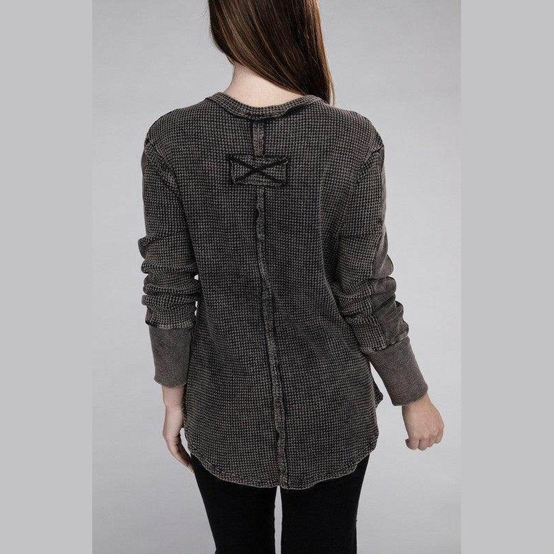 Back view of women's ZENANA baby waffle knit shirt with bow detail for a stylish look