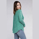 Women’s ZENANA baby waffle knit shirt in green with a relaxed fit and side slits