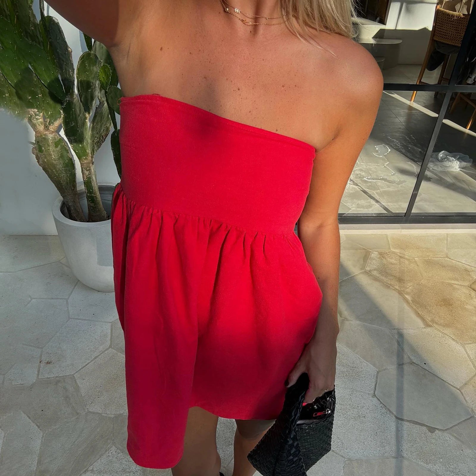 Bright red babydoll dress, strapless, perfect for summer outings