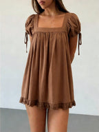 Women's brown babydoll top in lightweight fabric, perfect for casual outings