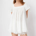Women's white babydoll top, lightweight fabric, perfect for summer casual wear